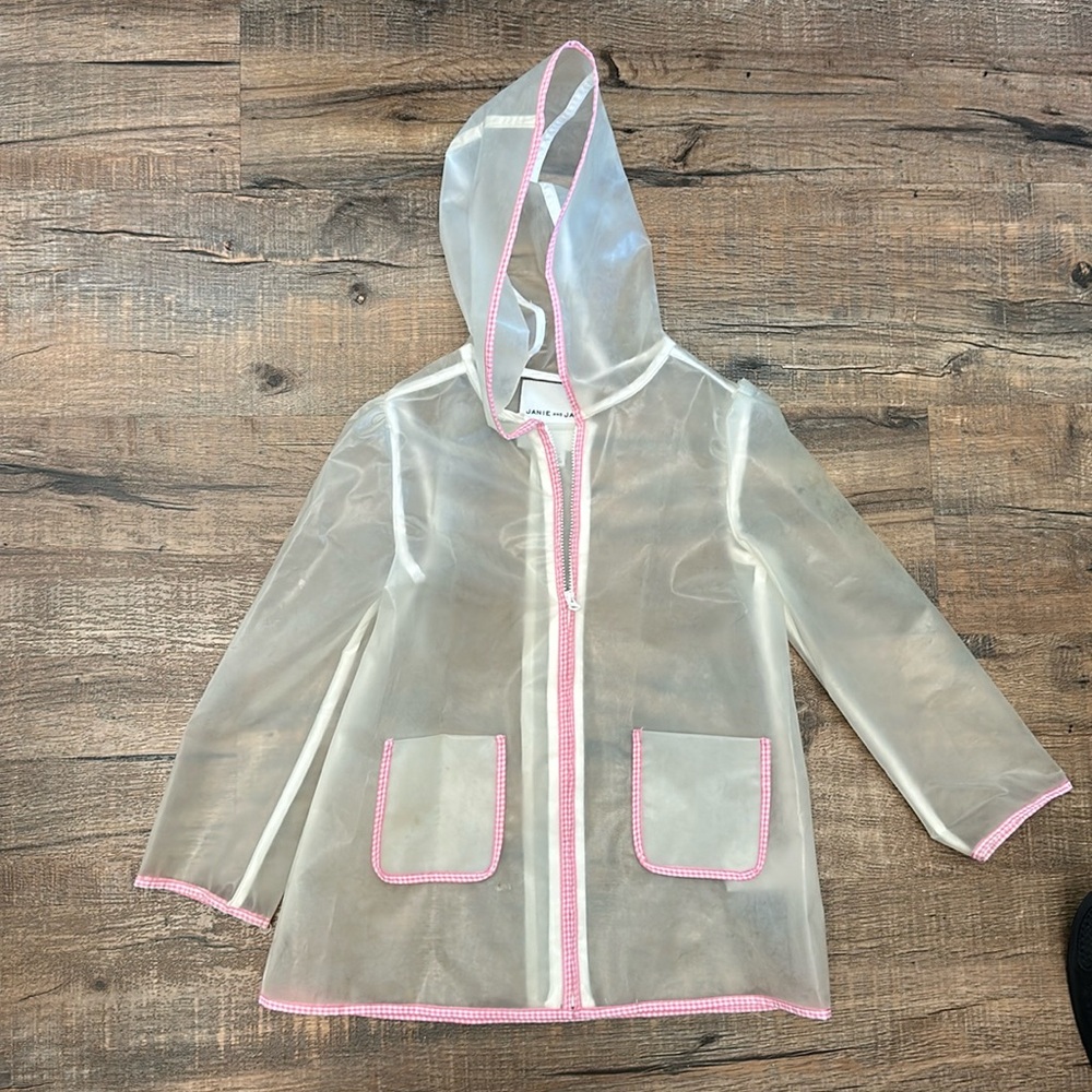 Super cute Janie and Jack girls’ raincoat. Size 3-4. Small hole near pocket.